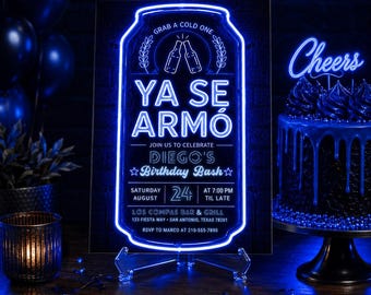 May include: A rectangular sign with a blue neon outline shaped like a beer can, featuring the text "GRAB A COLD ONE", "YA SE ARMÓ", "JOIN US TO CELEBRATE DIEGO'S BIRTHDAY BASH", "SATURDAY AUGUST 24 AT 7:00 PM TIL LATE", and "LOS COMPAS BAR & GRILL".