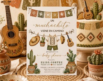 May include: A rectangular baby shower invitation card featuring a festive theme with illustrations of papel picado banners, a straw hat, a taco, a guitar, and a baby outfit. The text reads Un muchachito viene en camino, baby shower, Elisa Cortez, and event details.