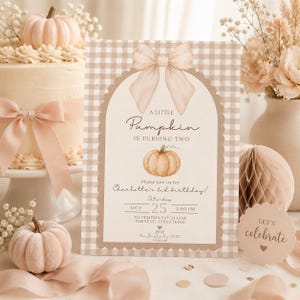 May include: A rectangular birthday invitation card with a beige and white gingham pattern, featuring a large illustration of a bow at the top and a pumpkin in the centre. The text reads A LITTLE Pumpkin IS TURNING TWO, Charlotte's 2nd birthday, OCT 25, 2:00 PM, 123 PUMPKIN PATCH LANE HARVEST, TEXAS 76000, and RSVP to Smoky by 10/20.