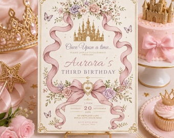 Puede incluir: Una tarjeta de invitación de cumpleaños rectangular con una ilustración de castillo dorado, cintas rosas y detalles florales. El texto dice: Once Upon a time.. PLEASE JOIN US TO CELEBRATE PRINCESS Aurora's THIRD BIRTHDAY SATURDAY 20 SEPTEMBER 2026 123 PRINCESS LANE ROYAL CITY, STATE 12345 RSVP WITH ROSE 123-456-7890.