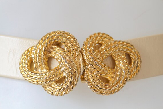 Gold Buckle with Intertwined Spiral with 3 Belts - image 1