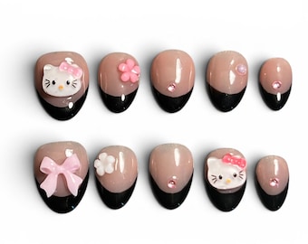 Hello Kitty Schwarze Französische Spitze Drücken Sie auf die Nägel | Kawaii Kokette Nägel | Rosa Schleife 3D Nägel | Kurze Mandelgel Nägel | Niedliche Japanische Nägel