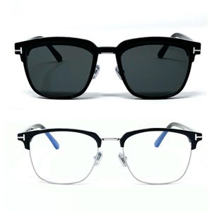 May include: Two pairs of spectacles are shown. The top pair are sunglasses with black frames and dark lenses. The bottom pair has a similar frame design, but with clear lenses and a silver-coloured lower frame.