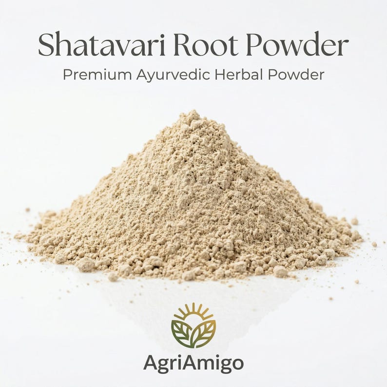 May include: A pile of light brown Shatavari Root Powder, a premium Ayurvedic herbal powder, is displayed on a white surface. The text "Shatavari Root Powder" and "Premium Ayurvedic Herbal Powder" are at the top. The AgriAmigo logo is at the bottom.