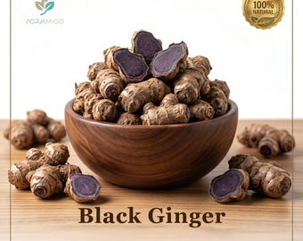 May include: A wooden bowl filled with black ginger, some pieces cut to reveal the purple interior. The text "Black Ginger" and "Premium Quality Product" are displayed below the bowl. A "100% Natural" seal is in the top right corner.