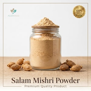 May include: A clear glass jar filled with light brown Salam Mishri powder, topped with a wooden lid. Several brown pods are scattered around the jar. The text "Salam Mishri Powder" and "Premium Quality Product" are displayed below.
