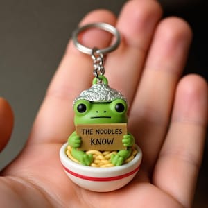 Tiny Conspiracy Noodle Frog Keychain, Hand-Painted 3D Printed Amphibian Charm for Backpacks
