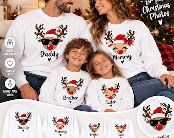 May include: A set of white crewneck sweatshirts featuring a graphic of a reindeer with a red nose, antlers decorated with Christmas lights, and the text Daddy, Mommy, Brother, or Sister. The Daddy reindeer wears sunglasses, while the others wear bows.