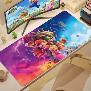 Könnte beinhalten: Rechteckige Schreibtischunterlage mit einer lebendigen Illustration von Super Mario-Charakteren. Das Design zeigt Mario, Luigi, Prinzessin Peach und andere Charaktere vor einem farbenfrohen Himmel und einer Landschaft.