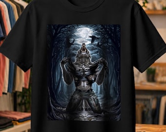 May include: A black short-sleeve t-shirt featuring a graphic print of a werewolf howling at a full moon in a dark forest. The creature is shown kneeling and tearing open its shirt, surrounded by trees and flying birds in a blue-toned scene.