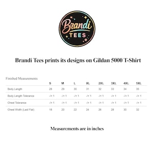 May include: A white background with the Brandi Tees logo and text. The text reads "Brandi Tees prints its designs on Gildan 5000 T-Shirt." A size chart shows measurements in inches for body length and chest width, ranging from S to 5XL.