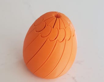 Articulated fidget egg