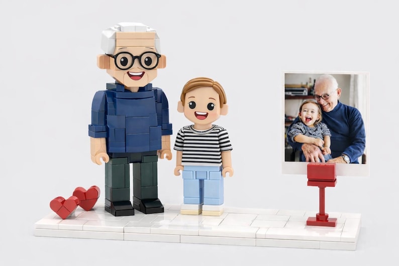 May include: A custom building block set featuring two figures: an older adult with white hair and glasses in a blue sweater, and a child in a striped shirt and light blue pants. Two red heart blocks and a photo stand with a picture are included.