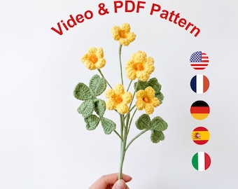 Peut inclure: Une tige de fleurs au crochet avec des fleurs jaunes et des feuilles vertes, sur fond blanc. Le texte « Video & PDF Pattern » et le logo SylvaWeave Crochet Patterns sont visibles.