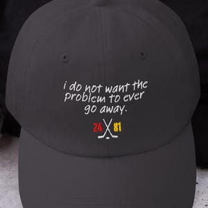Casquette brodée chauffante avec citation rivalité | Chapeau livresque « Never Want Problem to Go Away »
