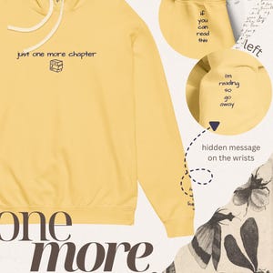 May include: A yellow hoodie with the text "just one more chapter" and a small stack of books. The right sleeve reads "if you can read this" and the left sleeve says "I'm reading so go away". A hidden message is on the wrists.