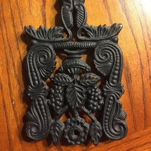 Trivet - Cast Iron- T4 Grape - grape scroll pattern- footed