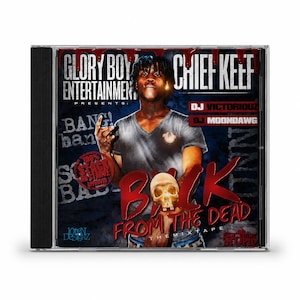 May include: CD case featuring Chief Keef's "Back From The Dead" mixtape. The cover art includes the text "Glory Boy Entertainment Presents" and "DJ Victorious" and "DJ Moondawg". The image features a person holding a skull.