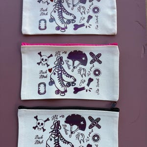 Petite pochette à fermeture éclair « Patchwork Roller »