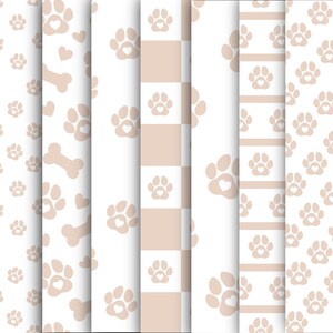 May include: A collection of patterned papers featuring a dog-themed design. The patterns include paw prints with hearts, dog bones, and a checkered pattern, all in shades of beige and white. These papers are suitable for crafts and pet-related projects.