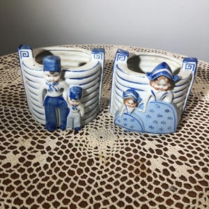 Ceramiczne doniczki/figurki: zabytkowy japoński holenderski chłopiec/dziewczynka