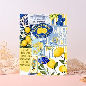 May include: A rectangular notebook featuring a collage of illustrations including yellow lemons, blue berries, cocktail glasses, and a fish. Text reads THE BREAKERS, OTTOLENGHI TEST KITCHEN, and WHEN YOU CAN FIND THE SUNSHINE BE THE SUNSHINE on a yellow panel.