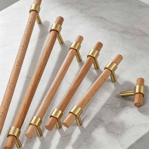 Kastgrepen van massief beukenhout, moderne ladehandgrepen van messing, minimalistische keukenknoppen