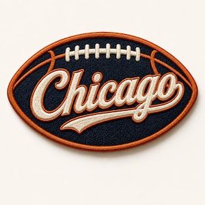 May include: Embroidered patch in the shape of a football. The patch is navy blue with the word "Chicago" in cream-colored script. The border and football details are orange.