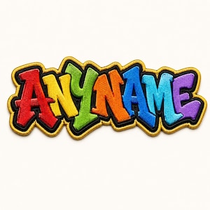 May include: Embroidered patch with the word "ANYNAME" in colorful graffiti-style lettering. The letters are outlined in black and filled with vibrant colors: red, yellow, green, orange, blue, and purple. The patch has a gold border.