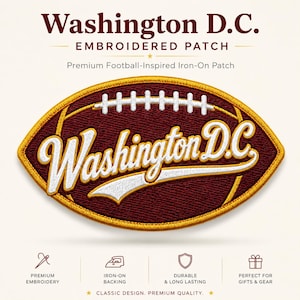 May include: Embroidered patch in the shape of a football, featuring "Washington D.C." in white script over a burgundy background. The patch has a gold border and includes the text "EMBROIDERED PATCH" at the top.