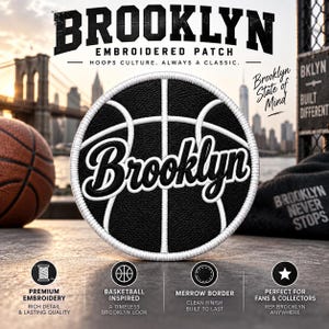May include: A circular embroidered patch featuring a black basketball design with white stitching lines and the word Brooklyn written in a white cursive script across the center. The patch has a white merrowed border and a textured black surface.