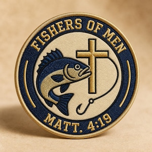 May include: A circular embroidered patch featuring a dark blue border with gold trim. The center is cream-colored, displaying a dark blue and gold fish, a gold cross, and a fishing hook. The text reads FISHERS OF MEN and MATT. 4:19 in gold.