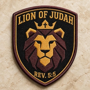 May include: A shield-shaped embroidered patch featuring a stylized lion head in gold and maroon on a black background. The text LION OF JUDAH is arched at the top, and REV. 5:5 is at the bottom in gold. A gold crown with a small cross sits above the lion.