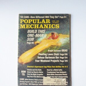 May include: A vintage cover of Popular Mechanics magazine from June 1969 featuring a yellow one-man submarine on the cover with the text "Build This One-Man Sub" and "Page 90".