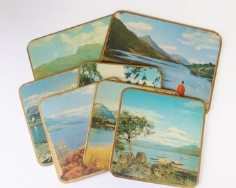 CLEARANCE Set of Seven Win El Ware Hot Pads, Landscape Scenes of Loch Leven Scotland, Made in England, Worn Edges Pitting