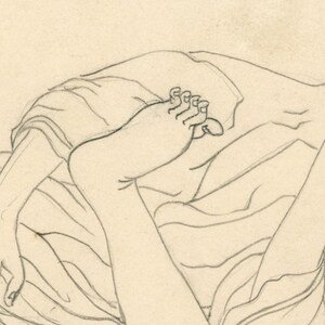 May include: A pencil sketch depicting a foot and leg, with the foot in a flexed position. The drawing is set against a pale beige backdrop, featuring gentle shading and visible lines. The leg is partly covered by draped fabric.