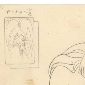 May include: Pencil sketch on aged paper. Two rectangular drawings depict a bird-like figure with stylized wings and a long tail. The top left corner has handwritten Japanese text. The sketch also includes a partial drawing of a person.