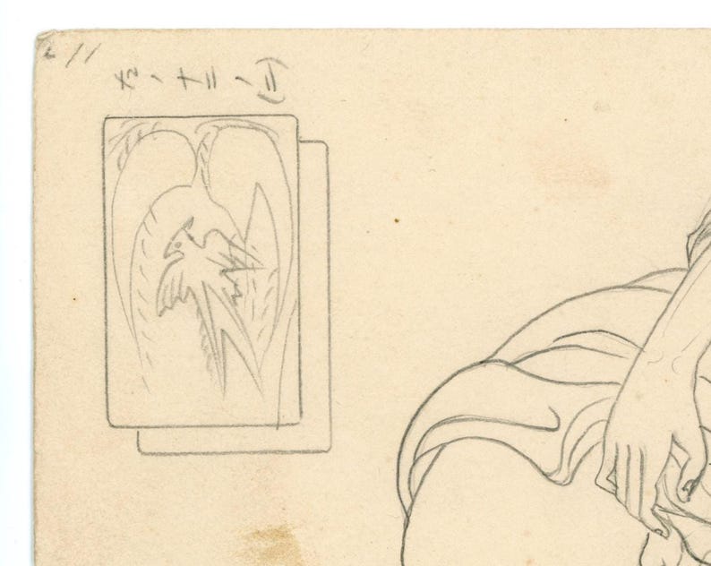 May include: Pencil sketch on aged paper. Two rectangular drawings depict a bird-like figure with stylized wings and a long tail. The top left corner has handwritten Japanese text. The sketch also includes a partial drawing of a person.