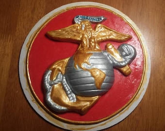 Marine Corps EGA cake topper with red base and gold trim