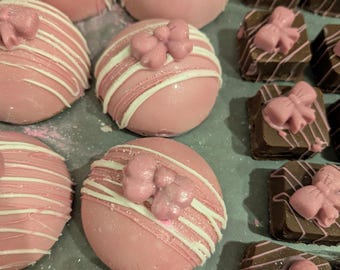 Hot Cocoa bombs and  marshmallow melters (pink)