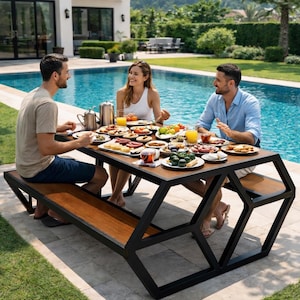 May include: A contemporary outdoor dining table with a geometric black metal frame and a wooden top. People are seated around the table, enjoying a meal with various dishes and drinks, near a swimming pool.