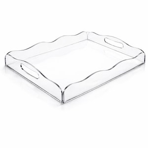 May include: A clear acrylic serving tray with a wavy edge design. The rectangular tray has two oval cut-out handles and is suitable for serving food or displaying items. The tray is transparent and sits on a white surface.