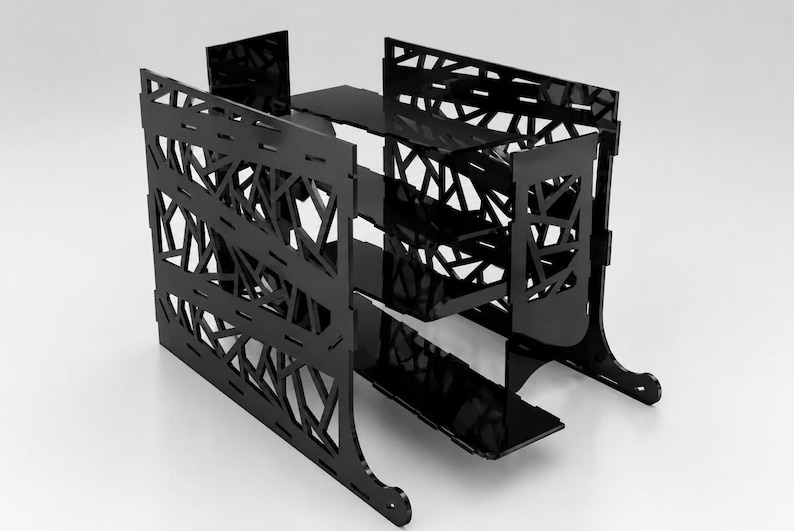 May include: Black, geometric-patterned storage unit with two shelves and a top surface. The unit has a modern design with cut-out shapes and curved feet. The unit is made of a glossy black material.