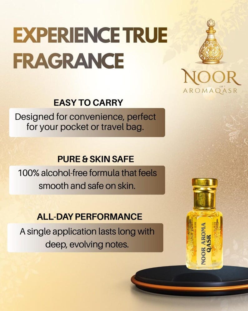 May include: A small glass bottle of Noor Aroma Qasr fragrance with a gold cap, featuring text that reads Experience True Fragrance, Easy to Carry, Pure & Skin Safe, and All-Day Performance, presented on a dark circular base against a gold background.