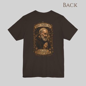 Padre Pio Catholic shirt back view featuring saint portrait artwork prayer healing devotion Christian faith apparel.