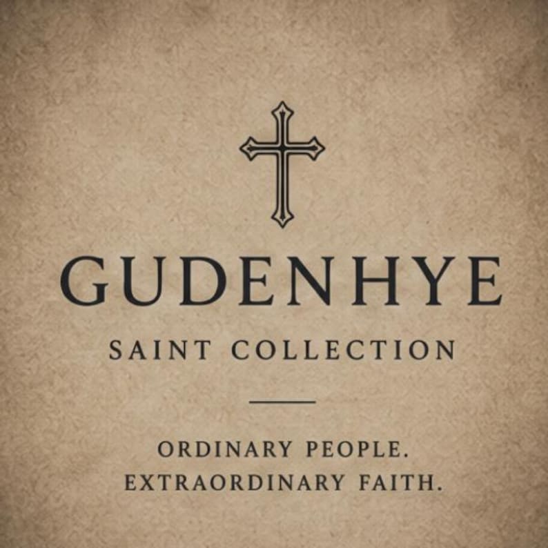 A tan textured background featuring a black cross icon above the text GUDENHYE SAINT COLLECTION. Below this, a horizontal line separates the text ORDINARY PEOPLE. EXTRAORDINARY FAITH. The design uses a clean, dark serif font throughout.
