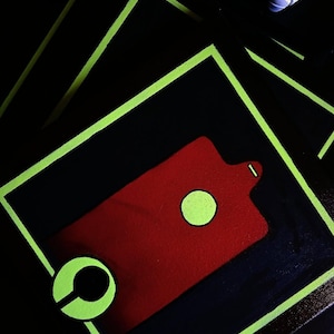 May include: A set of three ceramic mugs with a speckled, matte finish. The mugs are in shades of cream, light gray, and dark gray. Each mug has a simple, minimalist design, perfect for coffee or tea.