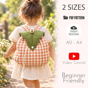 May include: A backpack with an orange and white gingham pattern and a green leaf-shaped flap. Text on the image includes 2 SIZES, PDF PATTERN, instant download, A0 - A4, Video Tutorial, and Beginner Friendly. The backpack has a drawstring closure.