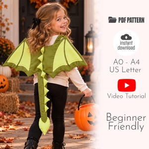 May include: A digital PDF sewing pattern for a dragon costume featuring green wings and a matching tail with spikes. The document includes instructions for A0, A4, and US Letter paper sizes, a video tutorial link, and is designed for beginners.