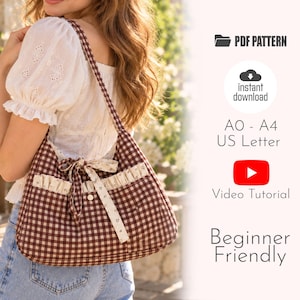 May include: A brown and white gingham shoulder bag with a ruffled pocket and a tie closure. The image includes text: PDF PATTERN, instant download, A0 - A4 US Letter, Video Tutorial, and Beginner Friendly. The bag features a small floral print.
